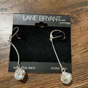 Woman pierce  ear rings.